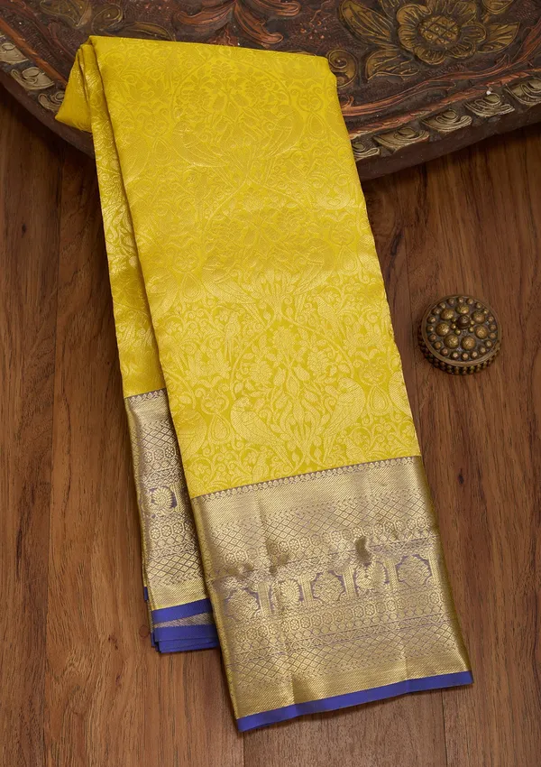 Yellow_Silk_Jaal_Saree_With_Matching_Blouse_Piece