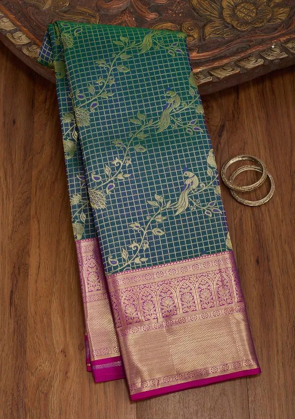 Peacock_Blue_Silk_Jaal_Saree_With_Matching_Blouse_Piece