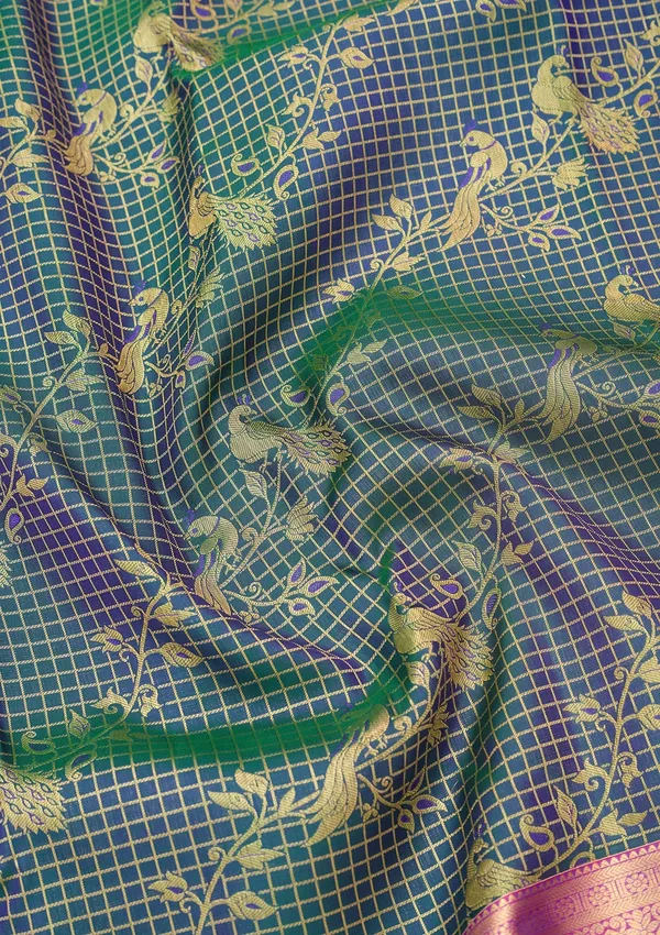 Peacock_Blue_Silk_Jaal_Saree_With_Matching_Blouse_Piece
