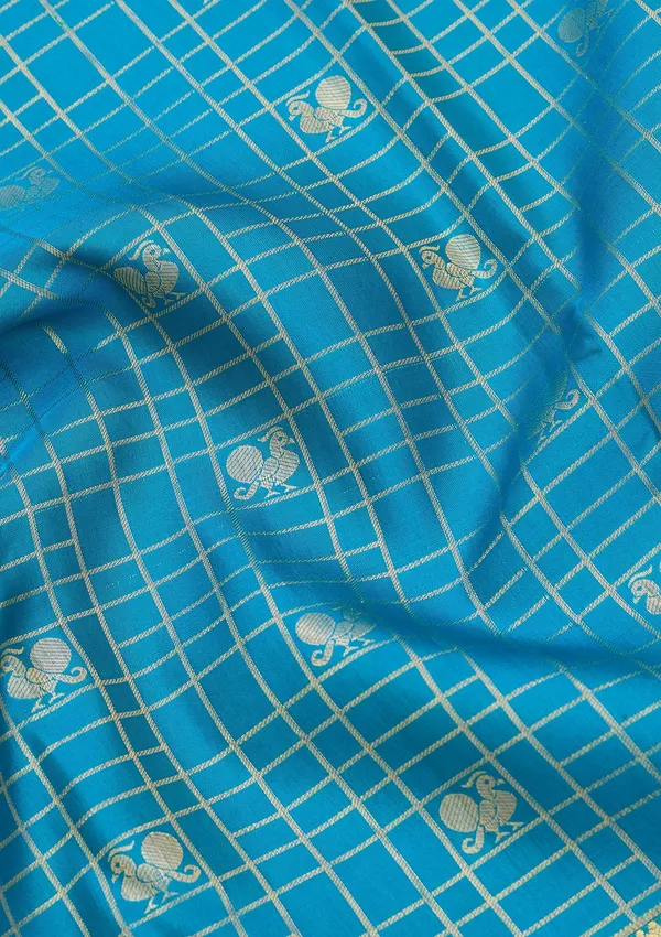 Turquoise_Blue_Silk_Checks_Saree_With_Matching_Blouse_Piece