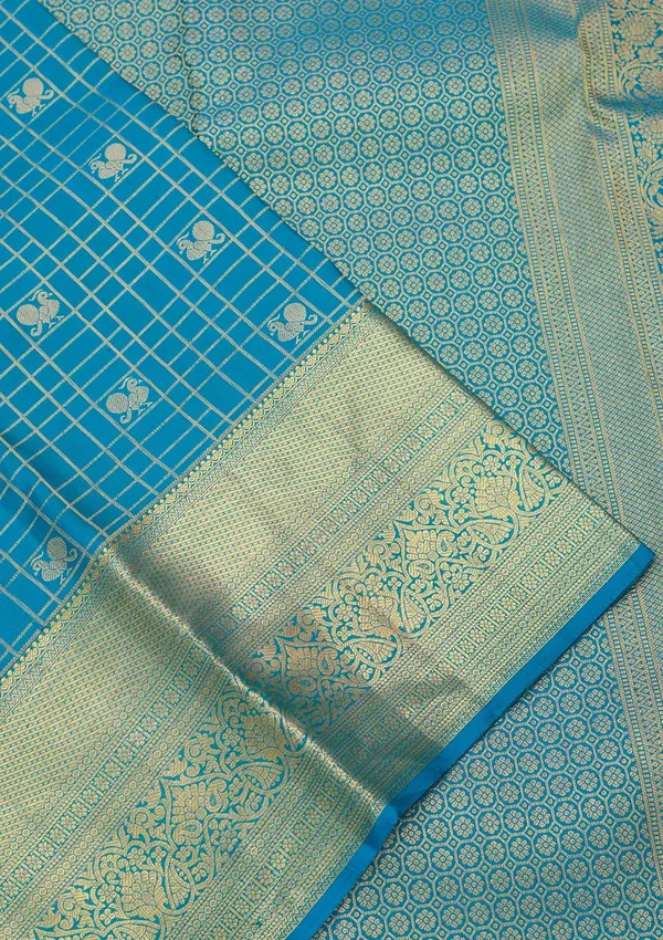 Turquoise_Blue_Silk_Checks_Saree_With_Matching_Blouse_Piece