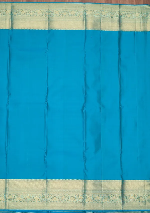 Turquoise_Blue_Silk_Checks_Saree_With_Matching_Blouse_Piece