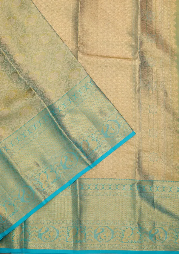 Sea_Green_Silk_Jaal_Saree_With_Matching_Blouse_Piece