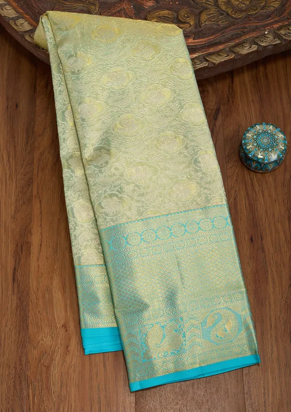 Sea_Green_Silk_Jaal_Saree_With_Matching_Blouse_Piece