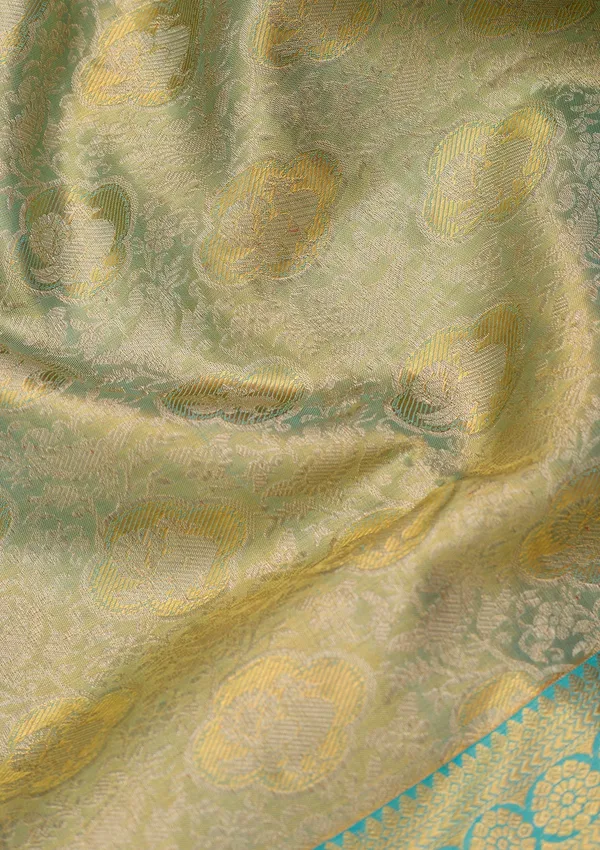 Sea_Green_Silk_Jaal_Saree_With_Matching_Blouse_Piece