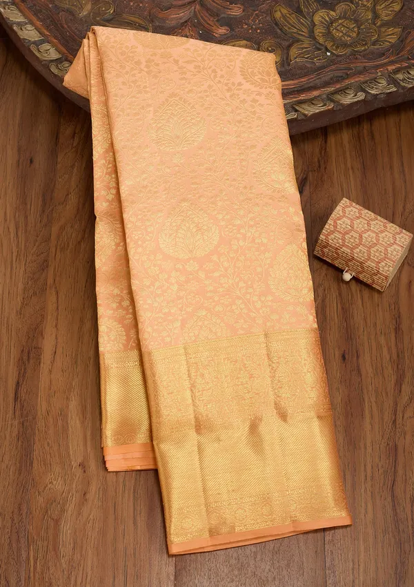 Peach_Silk_Jaal_Saree_With_Matching_Blouse_Piece