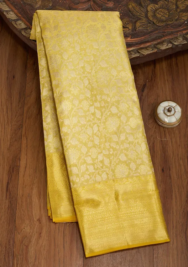 Yellow_Silk_Jaal_Saree_With_Matching_Blouse_Piece