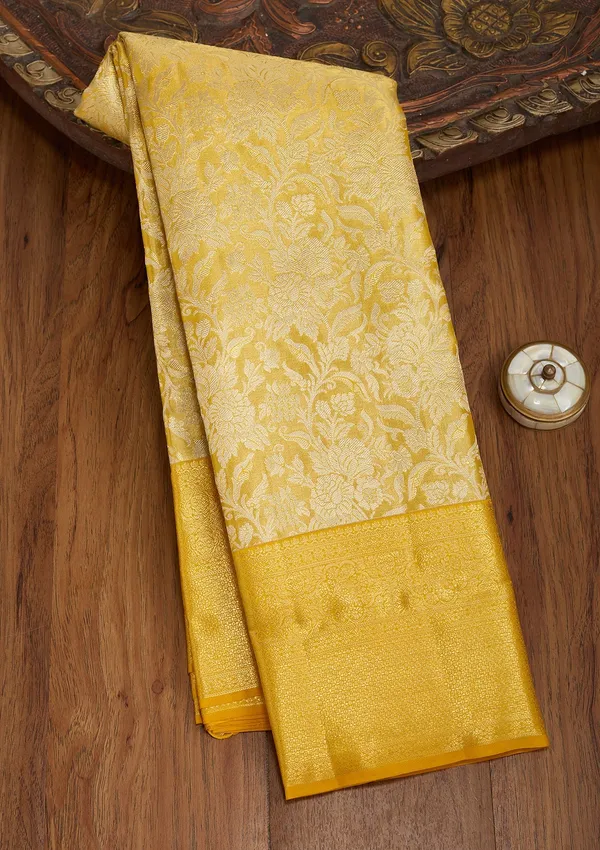 Yellow_Silk_Jaal_Saree_With_Matching_Blouse_Piece
