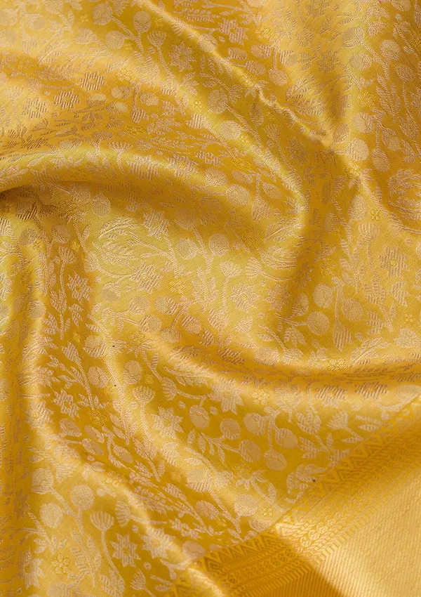 Yellow_Silk_Jaal_Saree_With_Matching_Blouse_Piece