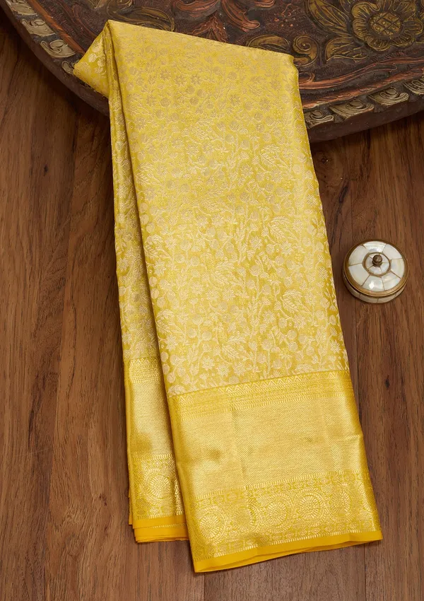 Yellow_Silk_Jaal_Saree_With_Matching_Blouse_Piece