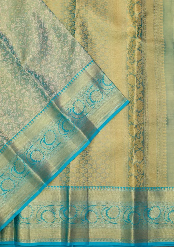 Sea_Green_Silk_Jaal_Saree_With_Matching_Blouse_Piece