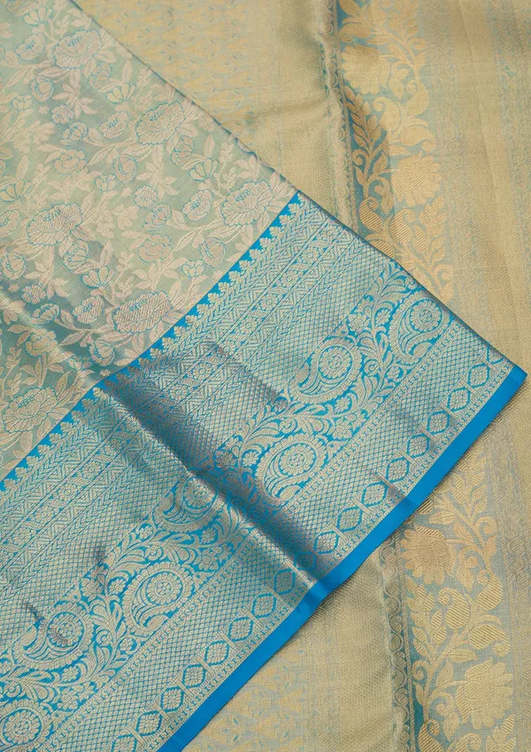 Sky_Blue_Silk_Jaal_Saree_With_Matching_Blouse_Piece