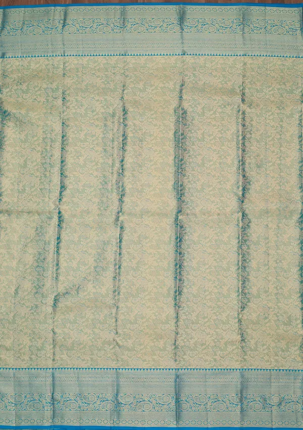 Sky_Blue_Silk_Jaal_Saree_With_Matching_Blouse_Piece