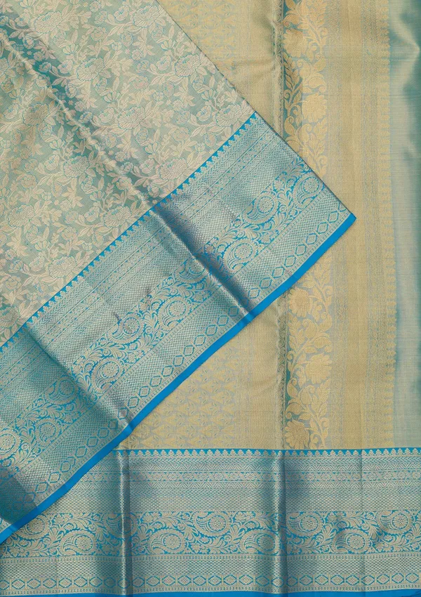 Sky_Blue_Silk_Jaal_Saree_With_Matching_Blouse_Piece