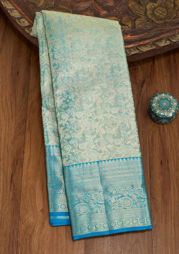 Sky_Blue_Silk_Jaal_Saree_With_Matching_Blouse_Piece