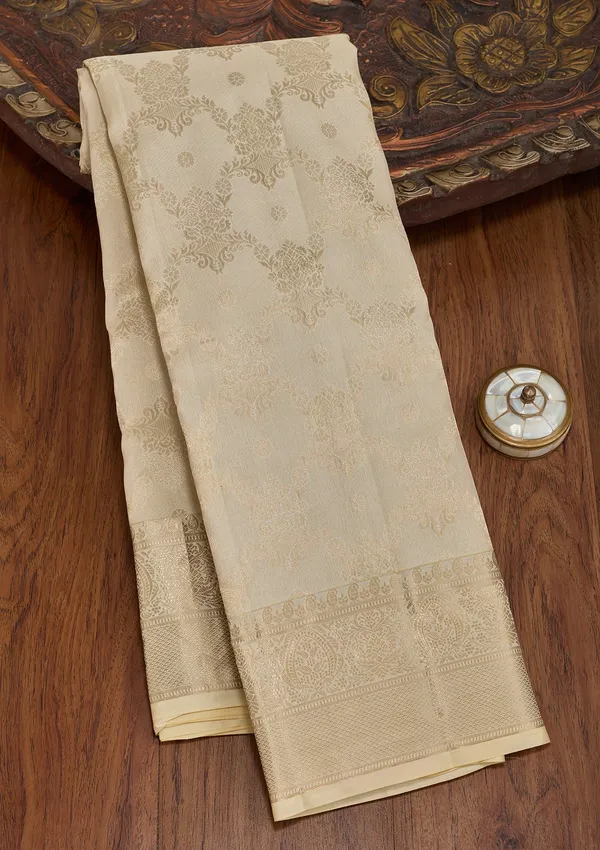 Cream_Silk_Jaal_Saree_With_Matching_Blouse_Piece