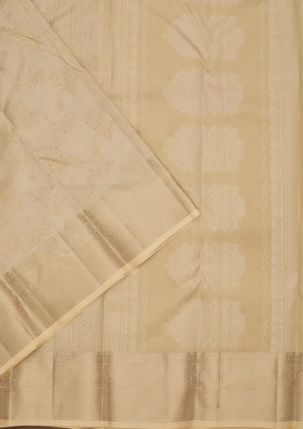 Cream_Silk_Jaal_Saree_With_Matching_Blouse_Piece