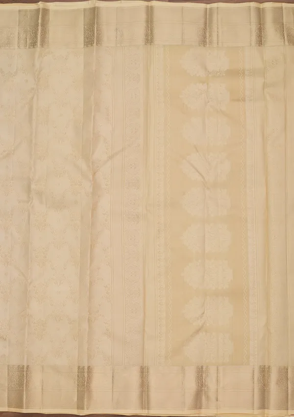 Cream_Silk_Jaal_Saree_With_Matching_Blouse_Piece