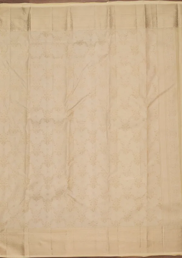 Cream_Silk_Jaal_Saree_With_Matching_Blouse_Piece