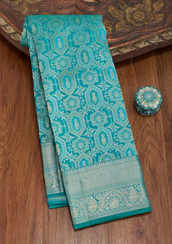 Peacock_Green_Silk_Jaal_Saree_With_Matching_Blouse_Piece