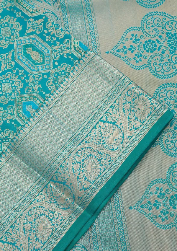 Peacock_Green_Silk_Jaal_Saree_With_Matching_Blouse_Piece