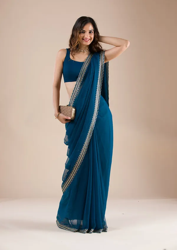 Peacock_Blue_Chiffon_Gold_Zariwork_Saree_With_Matching_Blouse_Piece