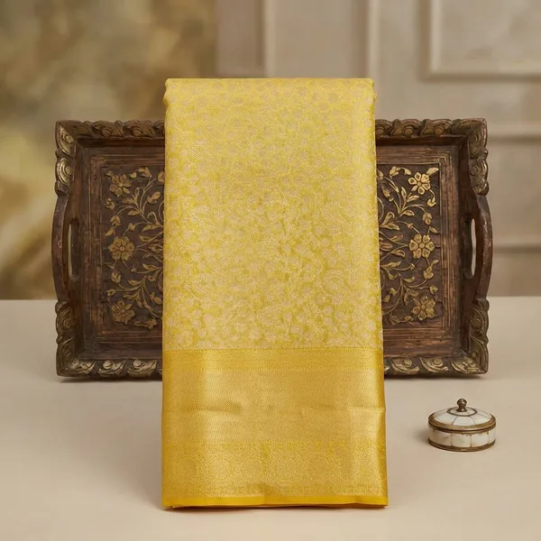 Yellow_Silk_Jaal_Saree_With_Matching_Blouse_Piece
