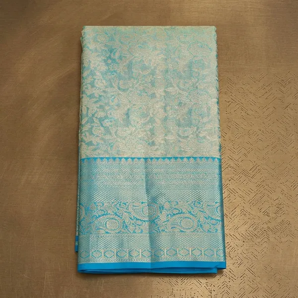 Sky_Blue_Silk_Jaal_Saree_With_Matching_Blouse_Piece