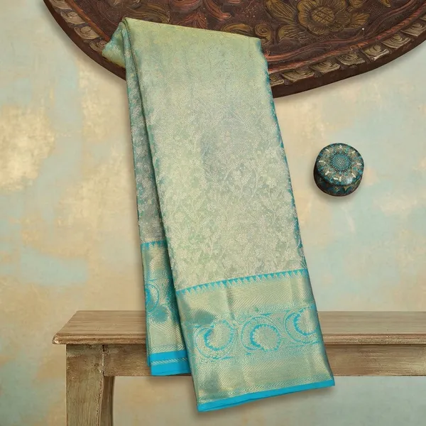 Sea_Green_Silk_Jaal_Saree_With_Matching_Blouse_Piece