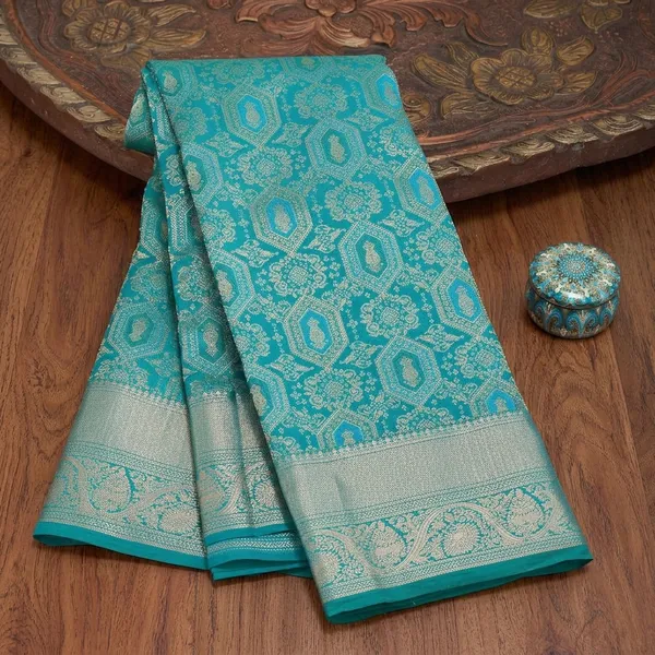 Peacock_Green_Silk_Jaal_Saree_With_Matching_Blouse_Piece