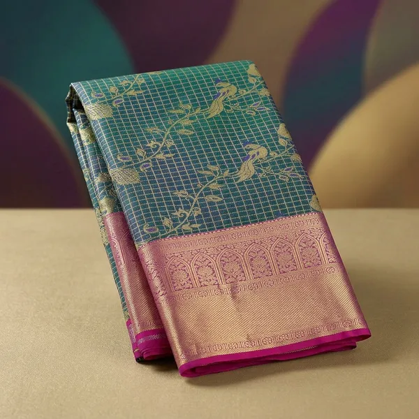 Peacock_Blue_Silk_Jaal_Saree_With_Matching_Blouse_Piece