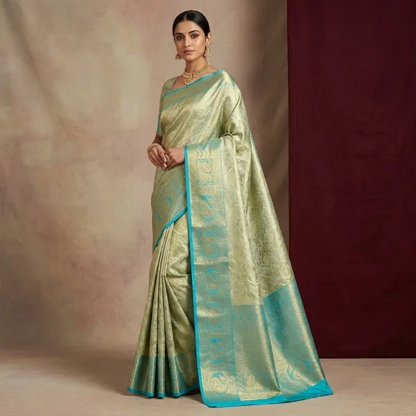 Sea_Green_Silk_Jaal_Saree_With_Matching_Blouse_Piece