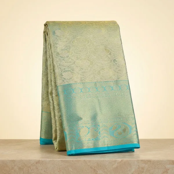 Sea_Green_Silk_Jaal_Saree_With_Matching_Blouse_Piece