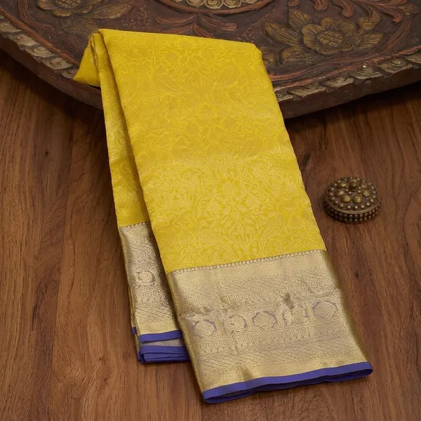 Yellow_Silk_Jaal_Saree_With_Matching_Blouse_Piece