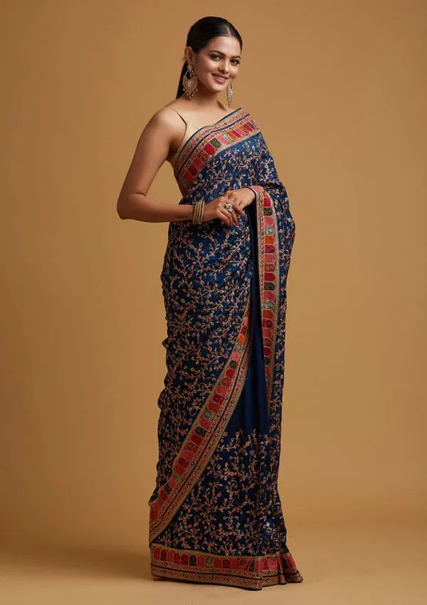 Peacock_Blue_Georgette_Gold_Zariwork_Saree_With_Matching_Blouse_Piece
