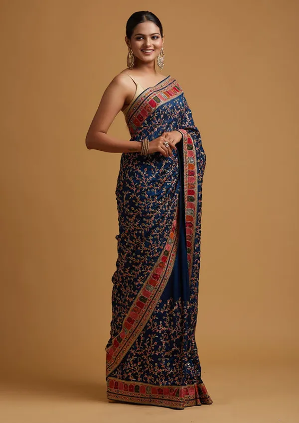 Peacock_Blue_Georgette_Gold_Zariwork_Saree_With_Matching_Blouse_Piece