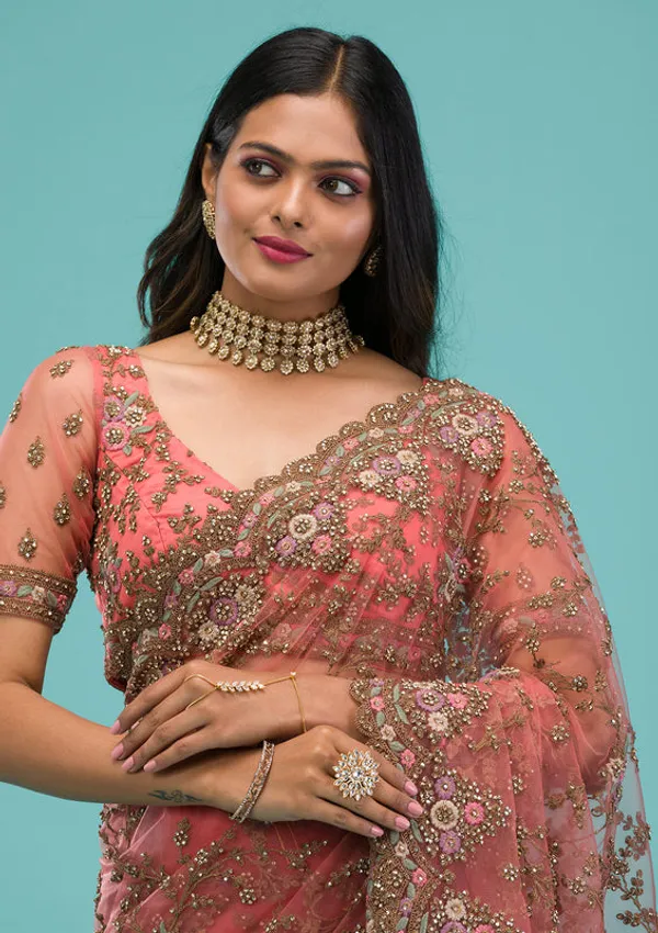 Peach_Net_Gold_Zariwork_Saree_With_Matching_Blouse_Piece