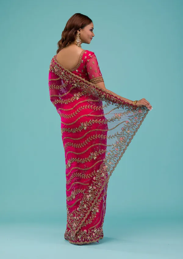 Rani_Pink_Net_Gold_Zariwork_Saree_With_Matching_Blouse_Piece
