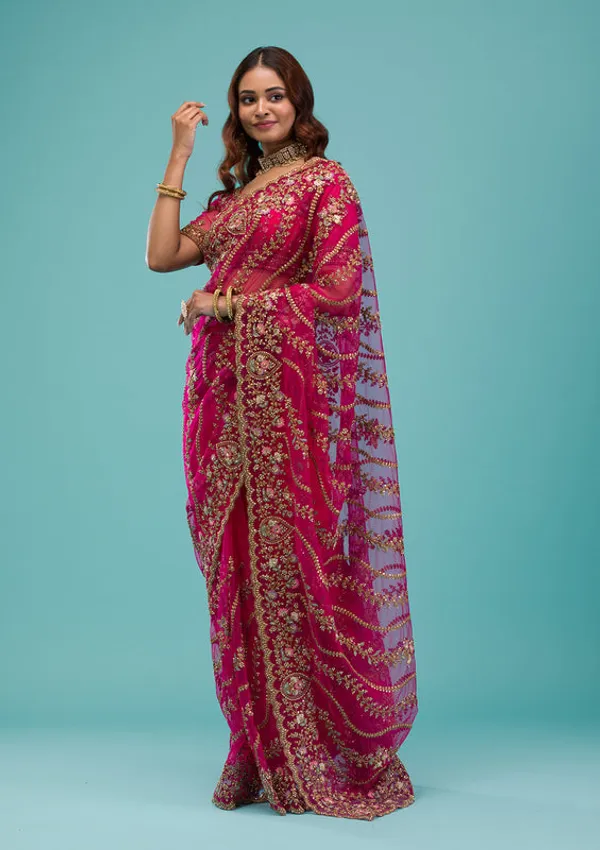 Rani_Pink_Net_Gold_Zariwork_Saree_With_Matching_Blouse_Piece
