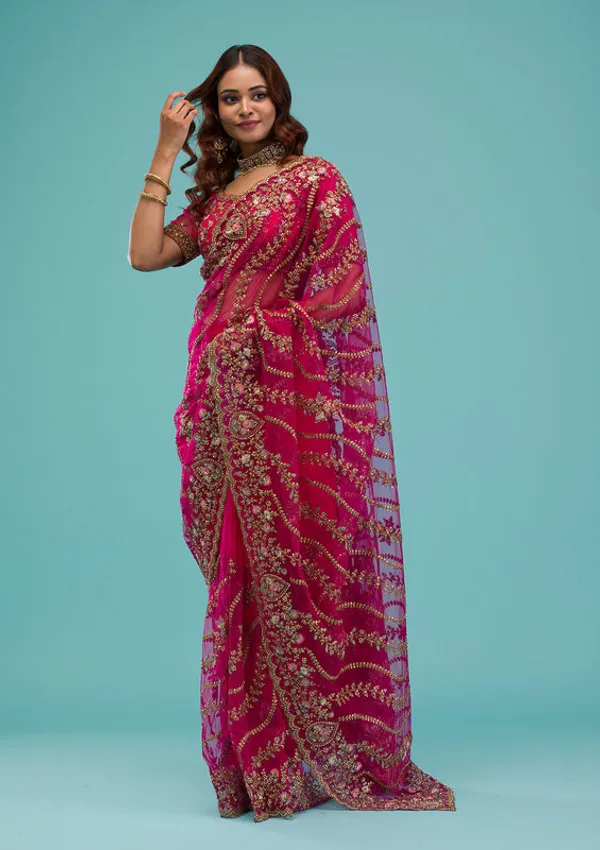 Rani_Pink_Net_Gold_Zariwork_Saree_With_Matching_Blouse_Piece