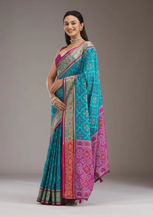 Turquoise_Blue_Silk_Jaal_Saree_With_Matching_Blouse_Piece