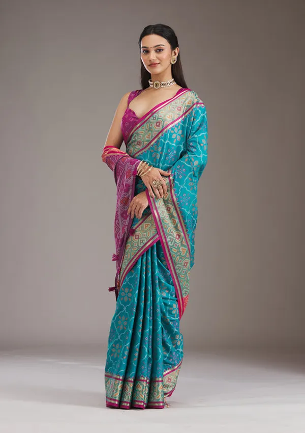 Turquoise_Blue_Silk_Jaal_Saree_With_Matching_Blouse_Piece