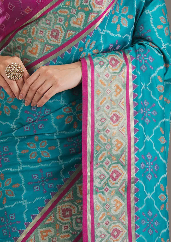 Turquoise_Blue_Silk_Jaal_Saree_With_Matching_Blouse_Piece