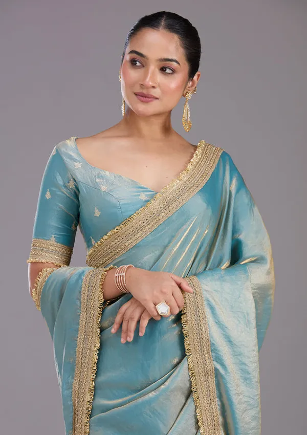 Blue_Tissue_Gold_Zariwork_Saree_With_Matching_Blouse_Piece