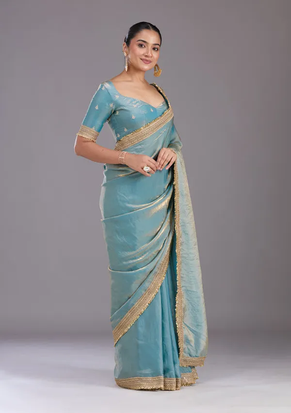 Blue_Tissue_Gold_Zariwork_Saree_With_Matching_Blouse_Piece