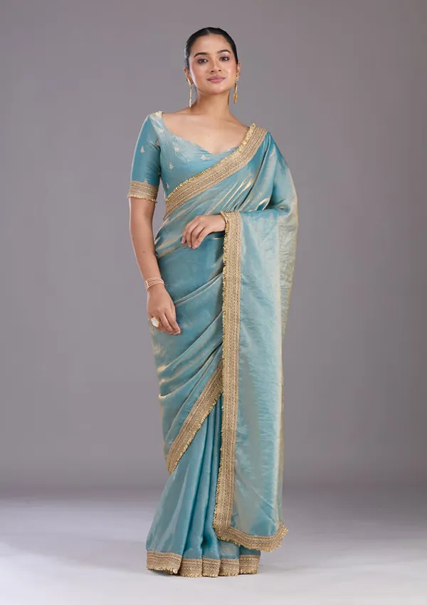 Blue_Tissue_Gold_Zariwork_Saree_With_Matching_Blouse_Piece