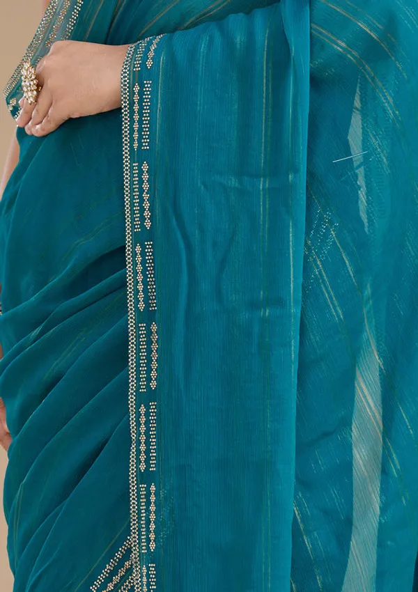 Peacock_Blue_Chiffon_Gold_Stonework_Saree_With_Matching_Blouse_Piece
