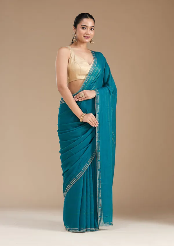 Peacock_Blue_Chiffon_Gold_Stonework_Saree_With_Matching_Blouse_Piece