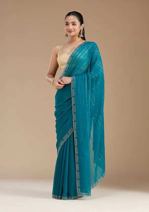 Peacock_Blue_Chiffon_Gold_Stonework_Saree_With_Matching_Blouse_Piece