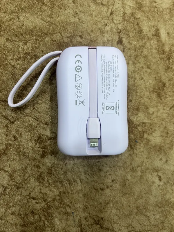 Purple_22.5W_Power_Bank_With_Built_And_In_Cables